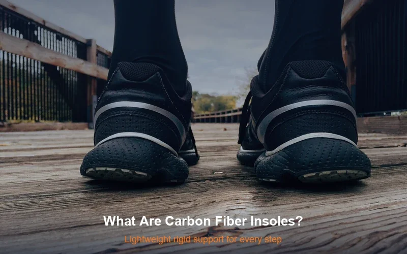 Athletic sneakers on wooden surface - carbon fiber insoles provide lightweight rigid support