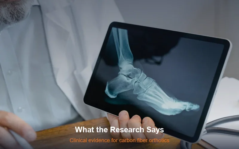 Doctor examining foot X-ray - research supports carbon fiber insoles for plantar fasciitis